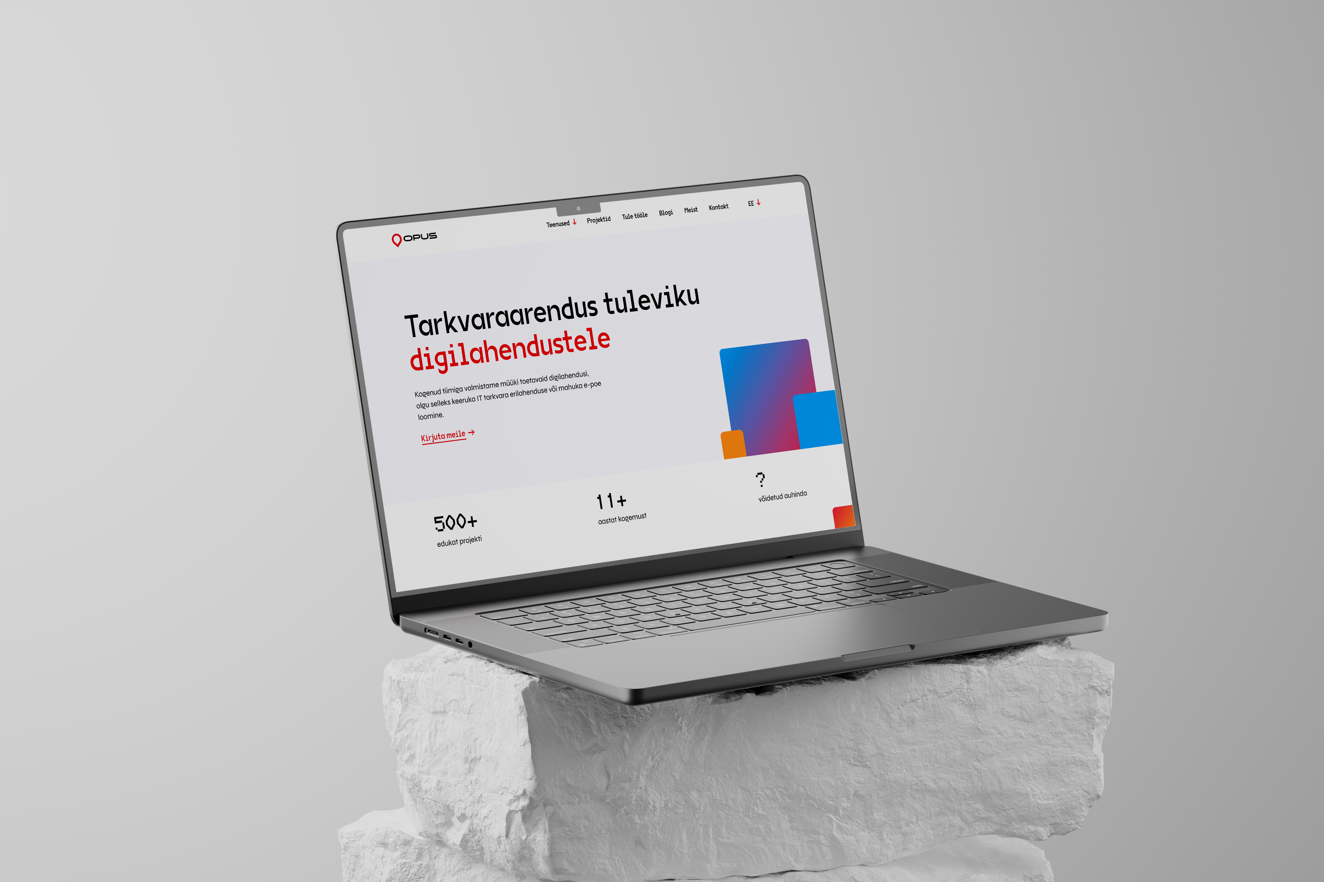 The new Opus website homepage shown on a laptop